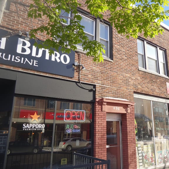 a brick building with a sign that says butro kuisine.
