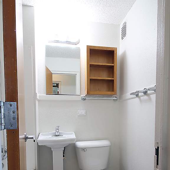 a bathroom with a sink toilet and bathtub