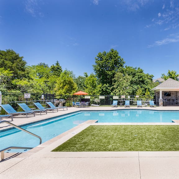 the swimming pool at the preserve at polk apartments ga at aventura at towne centre, ellisville, mo