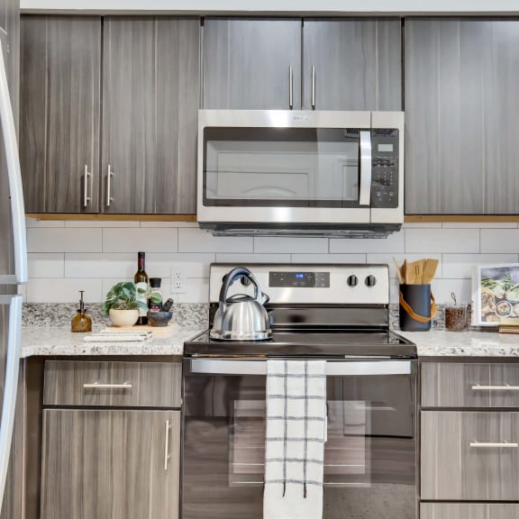 Thumbnail 6 of 16 Granite Counters at Bridge at Delco Flats, Austin Texas