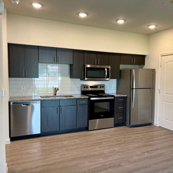 Thumbnail 13 of 14 E1 Kitchen