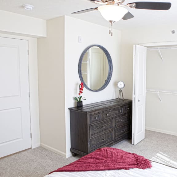 Thumbnail 9 of 9 a bedroom with a closet and a bed and a mirror  at Andover Pointe Apartment Homes, Nebraska, 68138