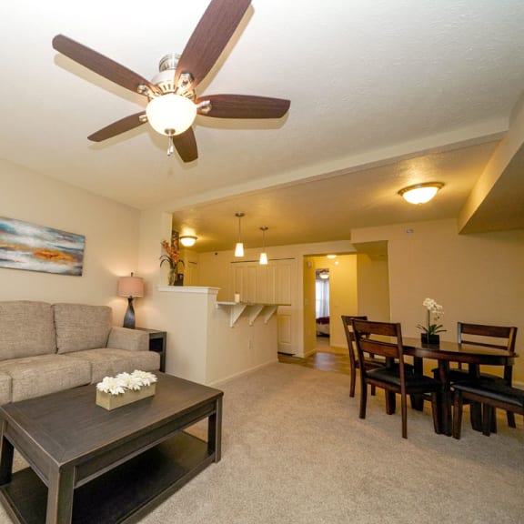 Thumbnail 3 of 9 a living room with a couch and a coffee table  at Andover Pointe Apartment Homes, La Vista