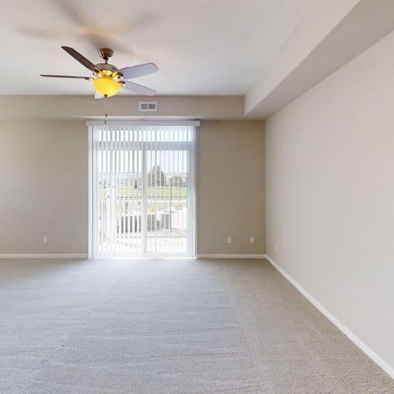 Thumbnail 3 of 9 Carpeted Living Area at Andover Pointe Apartment Homes, La Vista, 68138