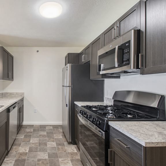 Thumbnail 6 of 10 a kitchen with stainless steel appliances  at Andover Pointe Apartment Homes, Nebraska