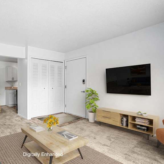 Thumbnail 4 of 8 A dining and living room with carpeting  at Apple Ridge Apartments, Walker, MI