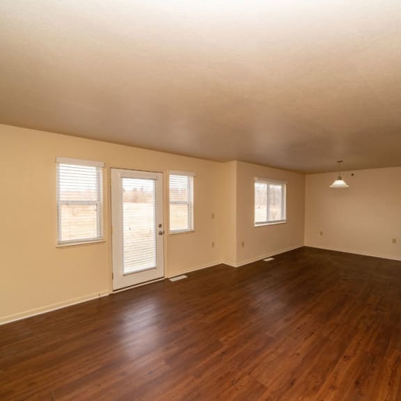 Thumbnail 3 of 14 an empty living room with a hard wood floor at Autumn Lakes Apartments and Townhomes, Indiana