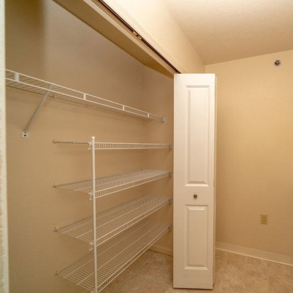 Thumbnail 6 of 11 a laundry room with a washer and dryer and a closet at Autumn Lakes Apartments and Townhomes, Mishawaka, IN
