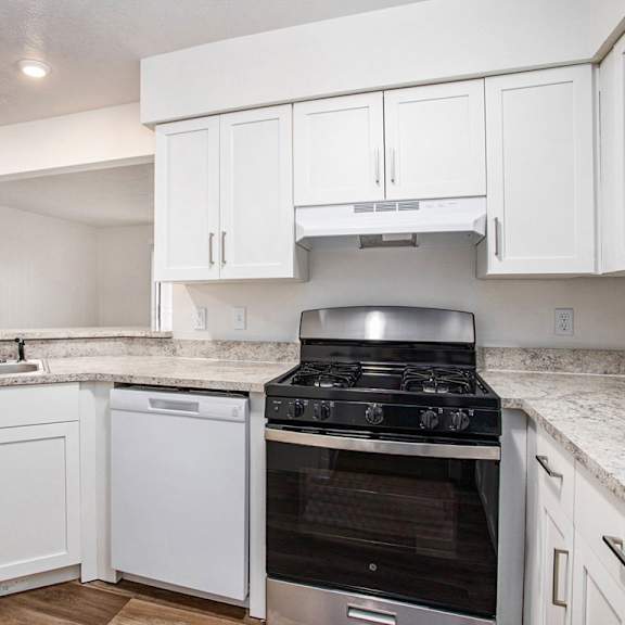Thumbnail 7 of 14 A kitchen with a breakfast bar at Brentwood Park Apartments, La Vista, 68128