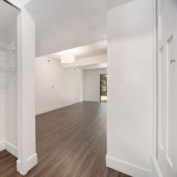 Thumbnail 3 of 19 entryway with closet and hard surface flooring at Byron Lakes Apartments in Byron Center, MI