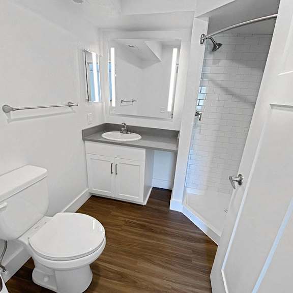 Thumbnail 24 of 24 A small bathroom with a shower at Byron Lakes Apartments, Michigan, 49315