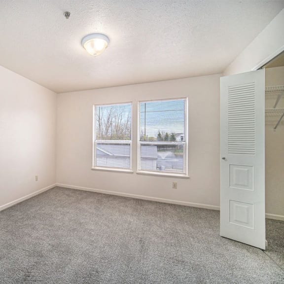 Thumbnail 9 of 11 Large bedroom with walk in closet at Canal 2 Apartments, Michigan, 48917