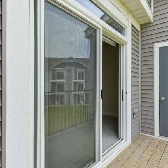Thumbnail 8 of 18 A private balcony with enclosed storage at Chase Creek Apartment Homes, Huntsville, AL