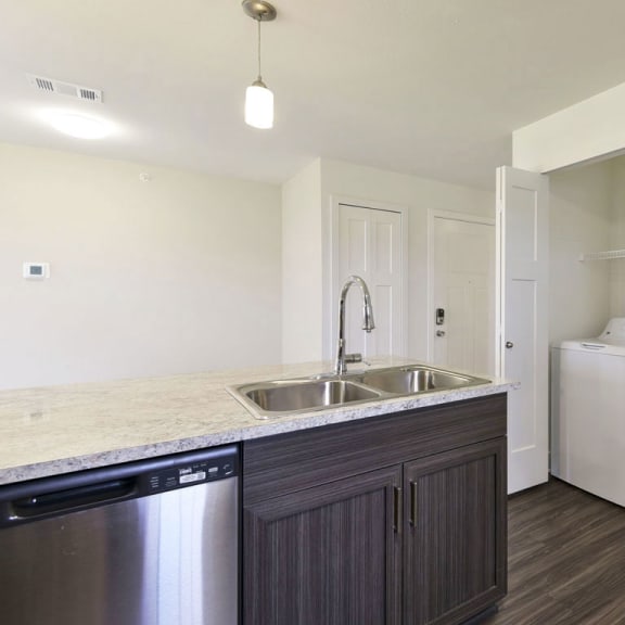 Thumbnail 6 of 10 1BE-Laundry1plan at Chase Creek Apartment Homes, Huntsville