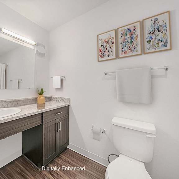 Thumbnail 13 of 18 A bathroom with a large vanity and hard surface flooring at Chase Creek Apartment Homes, Huntsville, 35811