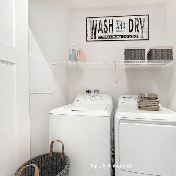 Thumbnail 12 of 18 A laundry room with a full size washer and dryer at Chase Creek Apartment Homes, Huntsville, 35811