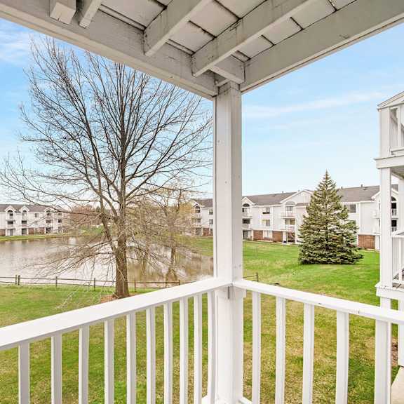 Thumbnail 4 of 9 A private balcony with a view at The Crossings Apartments, Grand Rapids, MI, 49508
