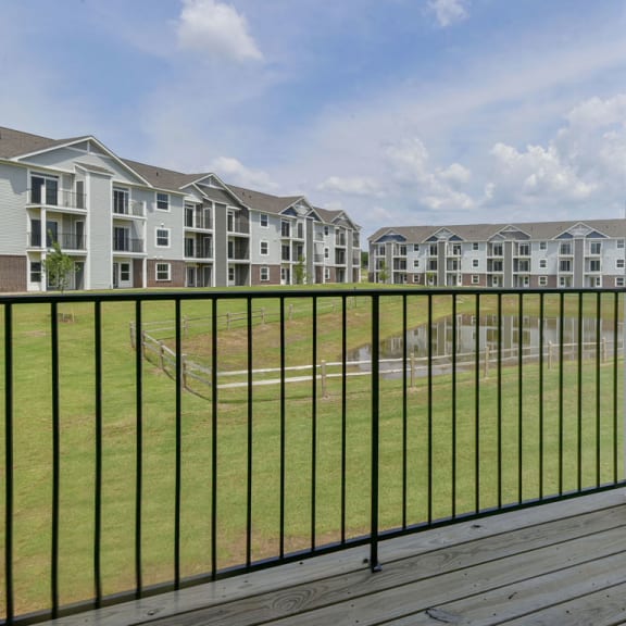 Thumbnail 5 of 13 A private balcony at Dodson Pointe Apartment Homes, Arkansas