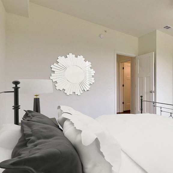 Thumbnail 12 of 14 A spacious bedroom with a bed and a closet with organizers at Dodson Pointe Apartment Homes, Rogers, AR