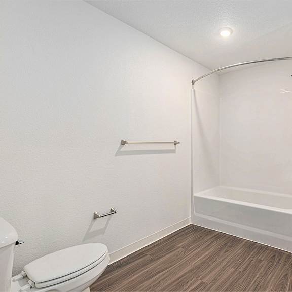 Thumbnail 12 of 18 Main bathroom with hard surface flooring at Eagle Ridge Apartment Homes, Traverse City, MI 49685