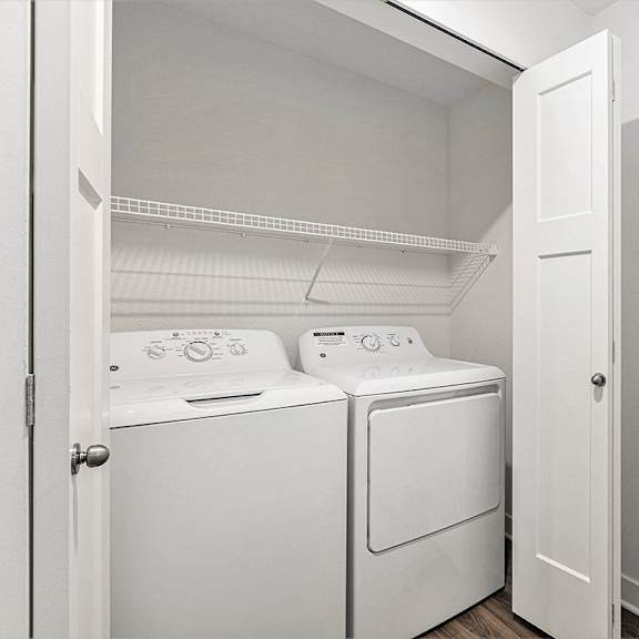 Thumbnail 11 of 18 Full size washer and dryer provided at Eagle Ridge Apartment Homes, Traverse City