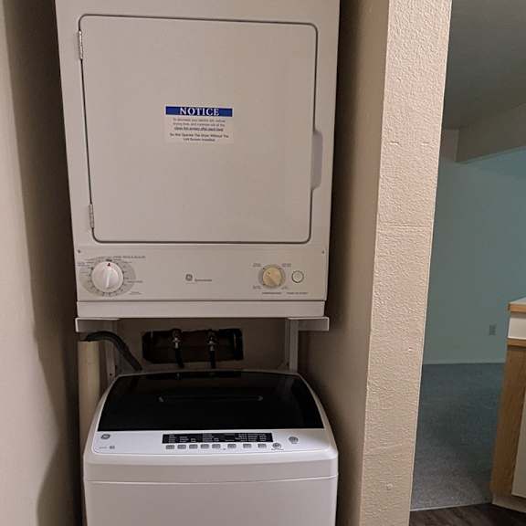 Thumbnail 8 of 11 A washer and dryer at Emerald Park Apartments in Kalamazoo, MI 49001
