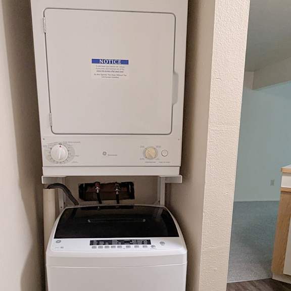 Thumbnail 5 of 7 A washer and dryer at Emerald Park Apartments in Kalamazoo, MI 49001
