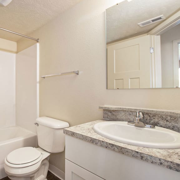 Thumbnail 11 of 13 an upgraded bathroom with white cabinetry at Old Farm Apartments, Elkhart, 46517