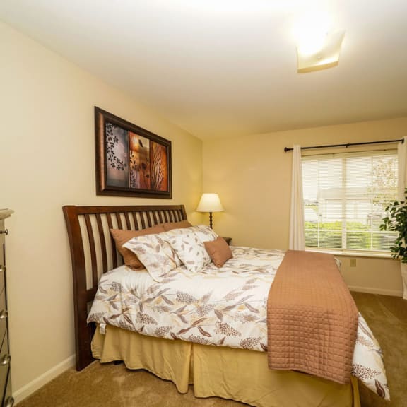 Thumbnail 7 of 9 bedroom with a large window and a closet at Fieldstream Apartment Homes, Ankeny, Iowa