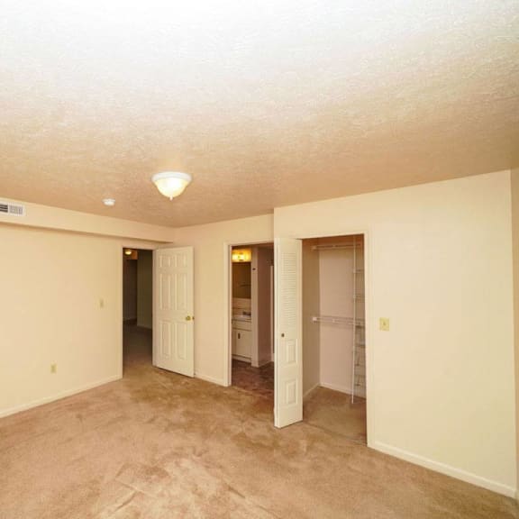 Thumbnail 11 of 12 A second bedroom with a walk in closet and second bath with shower at Foxwood and The Hermitage, Portage, 49024