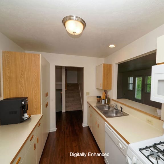 Thumbnail 5 of 14 kitchen with a gas stove and a dishwasher at Gull Prairie/Gull Run Apartments and Townhomes, Michigan, 49048