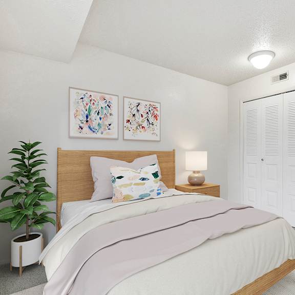 Thumbnail 10 of 12 A bedroom with a large closet at Granada Apartments, Jackson, 49202