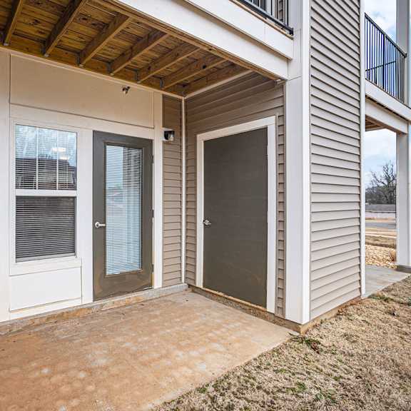 Thumbnail 6 of 19 Private patio with enclosed storage at The Grove Apartment Homes, Lincoln, 68512