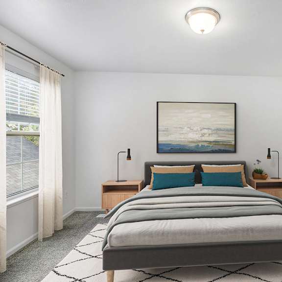 Thumbnail 10 of 15 A bedroom with a large bed and window with a walk-in closet at Gull Prairie/Gull Run Apartments and Townhomes, Michigan, 49048
