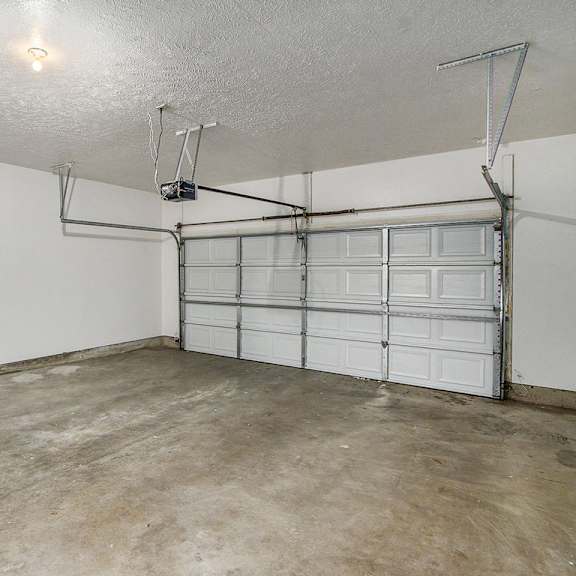 Thumbnail 15 of 15 An attached 2+ car garage at Gull Prairie/Gull Run Apartments and Townhomes, Michigan, 49048