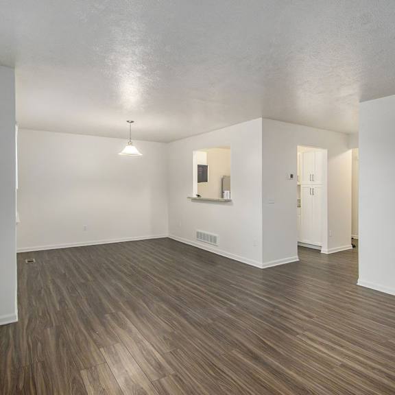 Thumbnail 5 of 15 dining room with vinyl plank flooring at Gull Prairie/Gull Run Apartments and Townhomes, Michigan, 49048