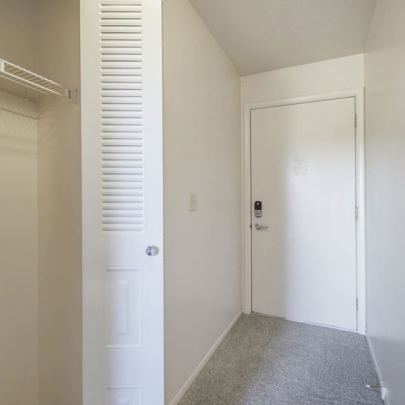 Thumbnail 3 of 14 an entry hallway with a closet at Gull Prairie/Gull Run Apartments and Townhomes, Michigan