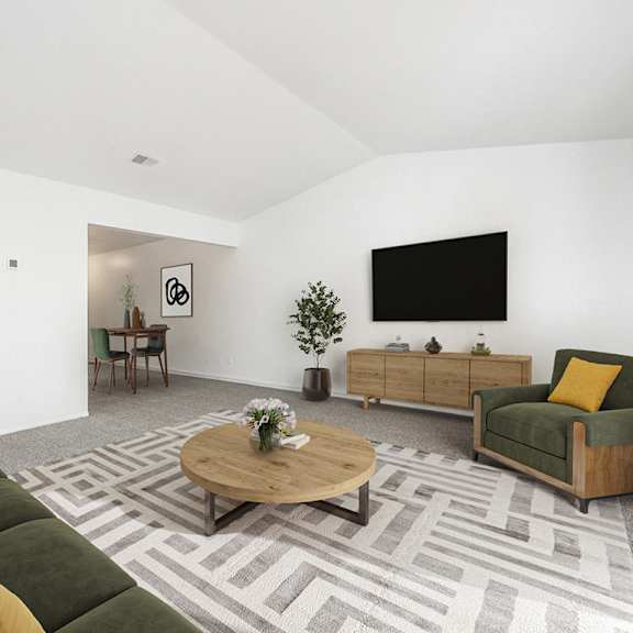 Thumbnail 3 of 13 second floor living room with a cathedral ceiling at Hampton Lakes Apartments, Michigan, 49534