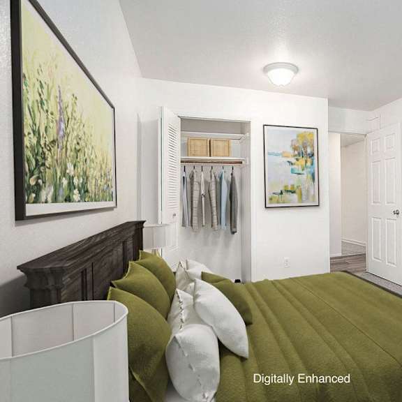Thumbnail 12 of 15 A bedroom with a large closet at Hampton Lakes Apartments, Michigan, 49534