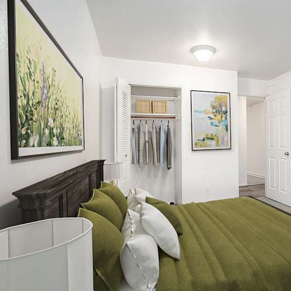 Thumbnail 11 of 14 A bedroom with a large closet at Hampton Lakes Apartments, Michigan, 49534