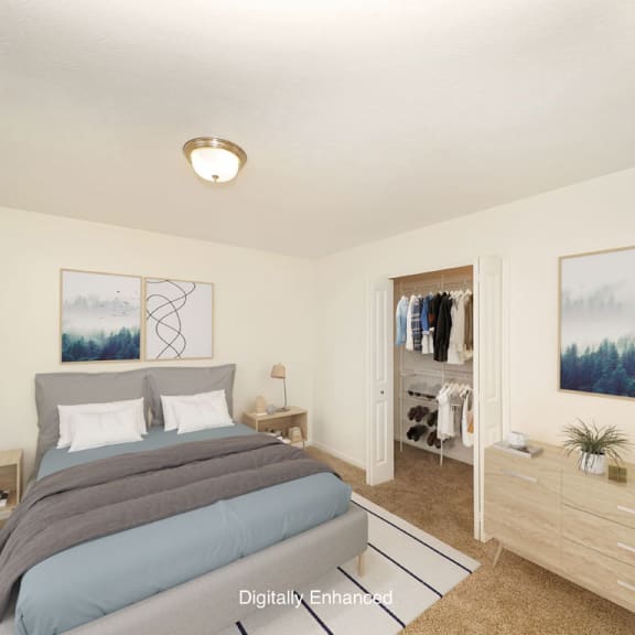 Thumbnail 9 of 15 a bedroom with a bed and a walk in closet at Foxwood and The Hermitage, Portage, MI, 49024