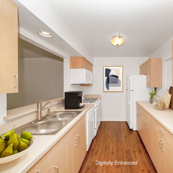 Thumbnail 5 of 15 kitchen with hard surface floors at Foxwood and The Hermitage, Portage, MI, 49024