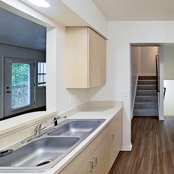 Thumbnail 8 of 18 Kitchen with a microwave, dishwasher, stove, and refrigerator at Foxwood and The Hermitage, Portage, MI, 49024 at Foxwood and The Hermitage, Michigan