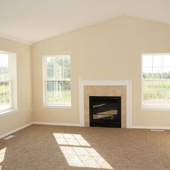 Thumbnail 6 of 12 A living room with a fireplace and two windows at Foxwood and The Hermitage, Portage, MI, 49024