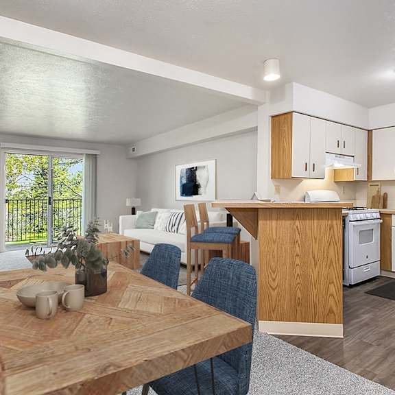 Thumbnail 3 of 9 A modern kitchen with a dining table and chairs at The Highlands Apartments, Indiana