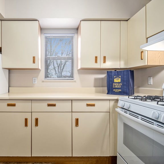 Thumbnail 8 of 12 a kitchen with a window at Indian Lakes Apartments, Mishawaka, IN