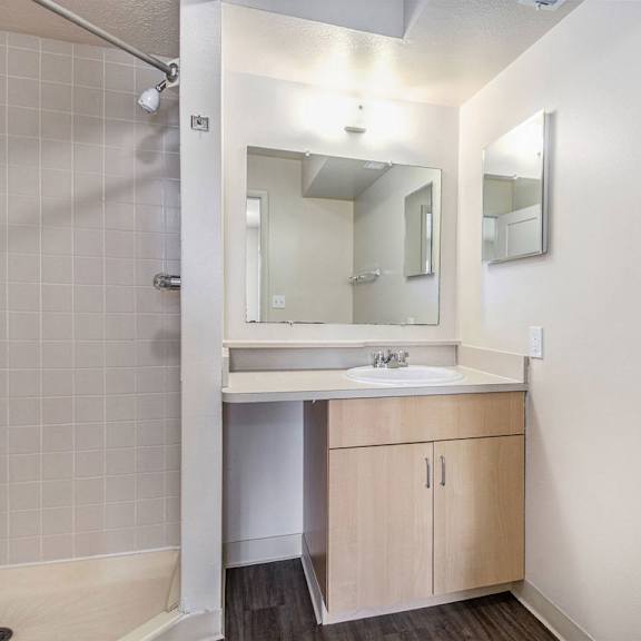 Thumbnail 16 of 16 a bathroom with a sink and a mirror at Indian Lakes Apartments, Mishawaka, IN