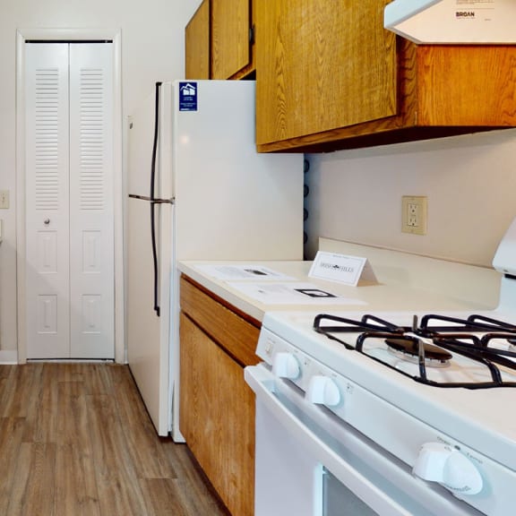 Thumbnail 8 of 14 A galley-style kitchen at Irish Hills Apartments, Indiana