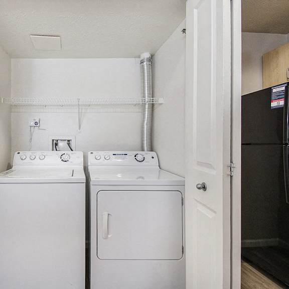 Thumbnail 6 of 15 A full size washer and dryer at Lynbrook Apartments and Townhomes, Elkhorn, NE, 68022