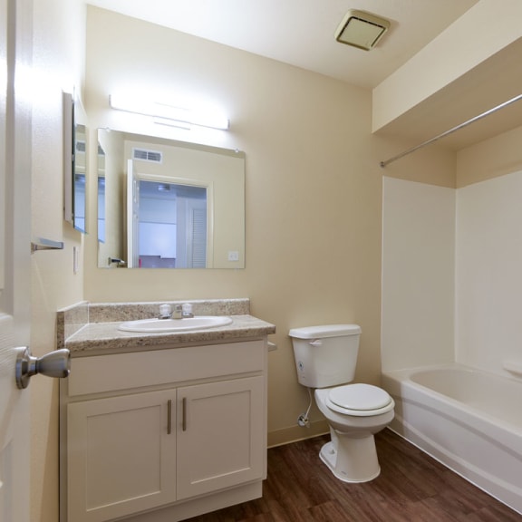 Thumbnail 7 of 9 a bathroom with a sink toilet and a bath tub at Old Monterey Apartments, Springfield